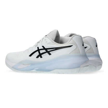 White tennis shoe with black logo on a white background