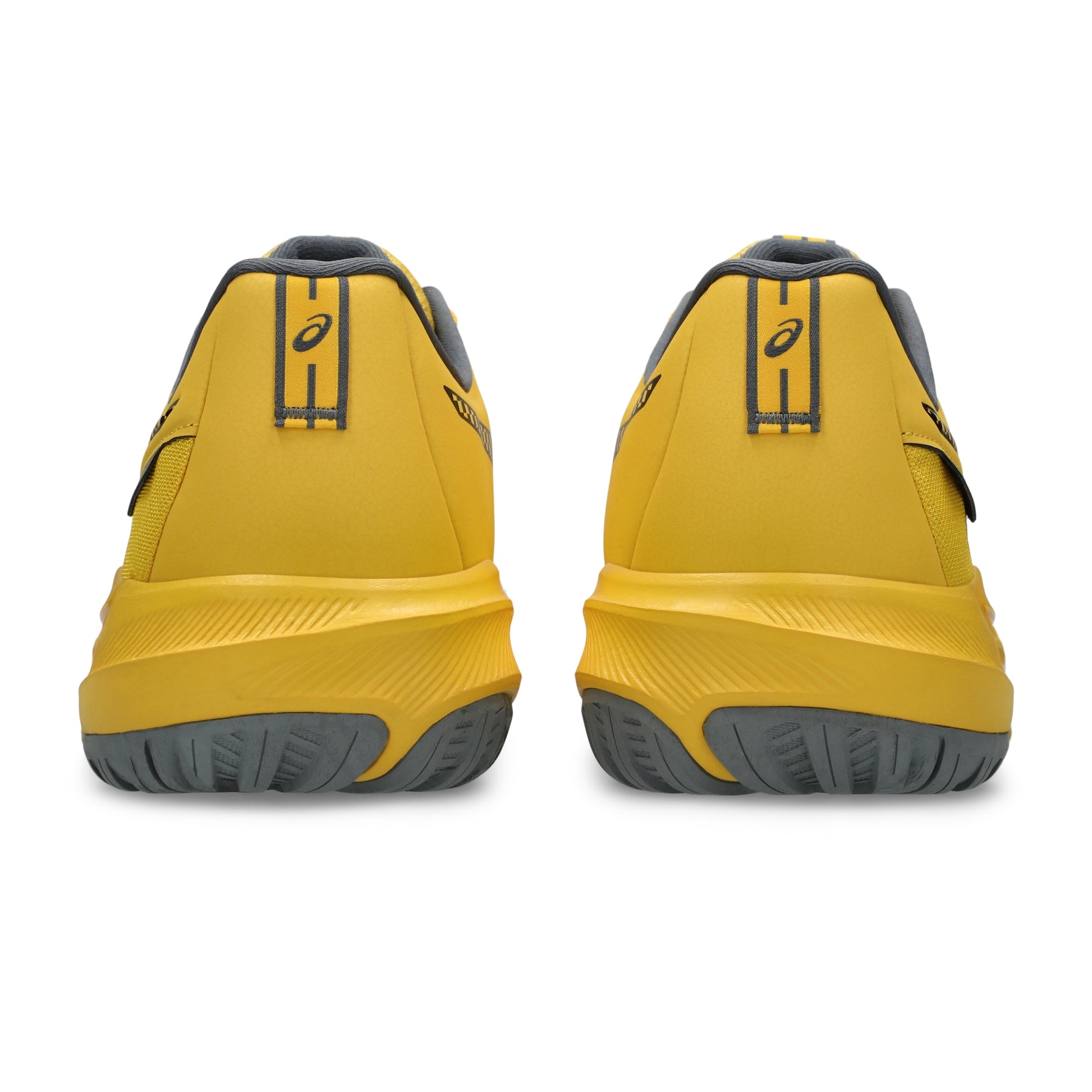 A pair of yellow Asics tennis shoes shown from the back, featuring a yellow upper, thick yellow midsole, and dark gray sole and heel details, with the Asics logo visible on the heel strap.