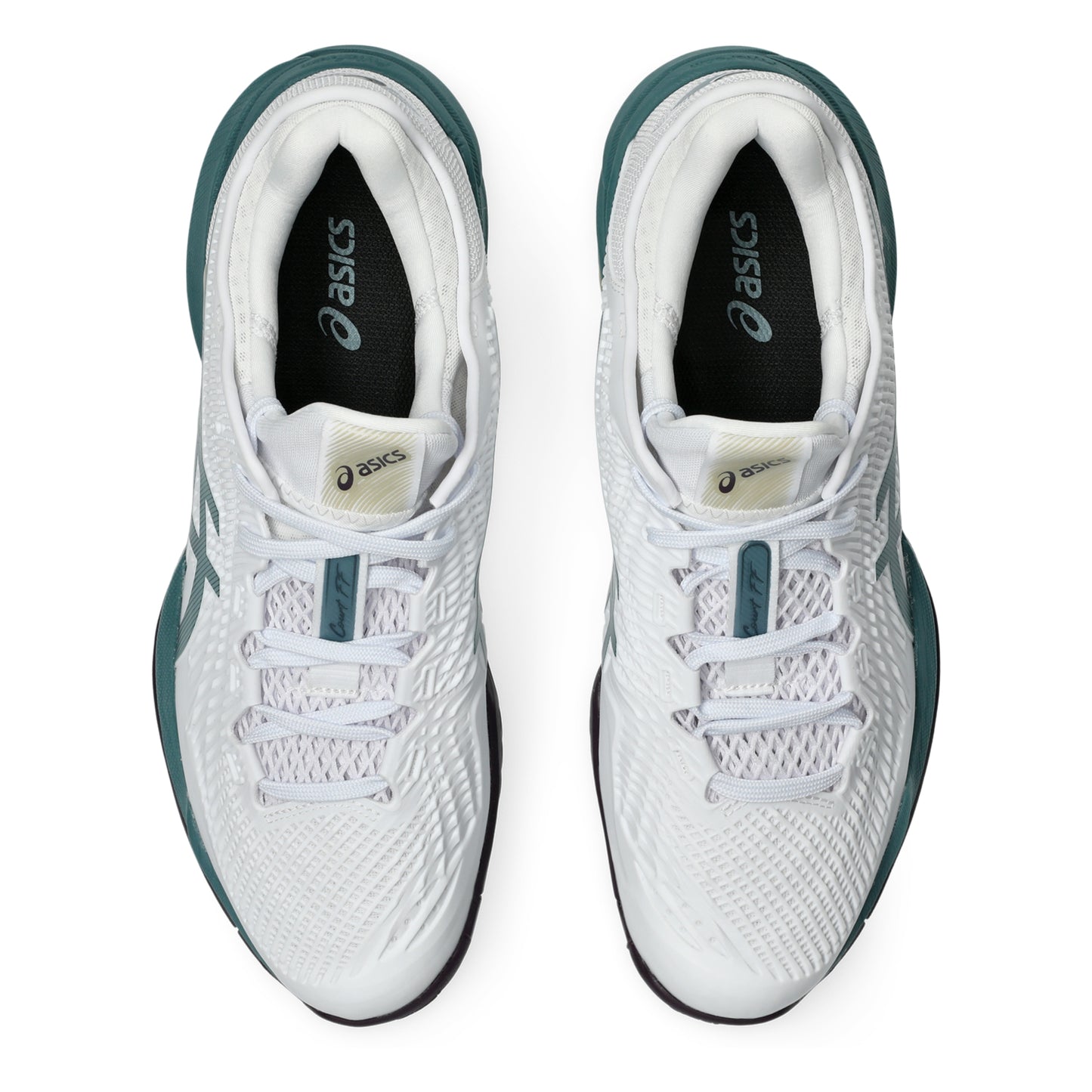 White and dark green Asics tennis shoes with a black sole on a white background