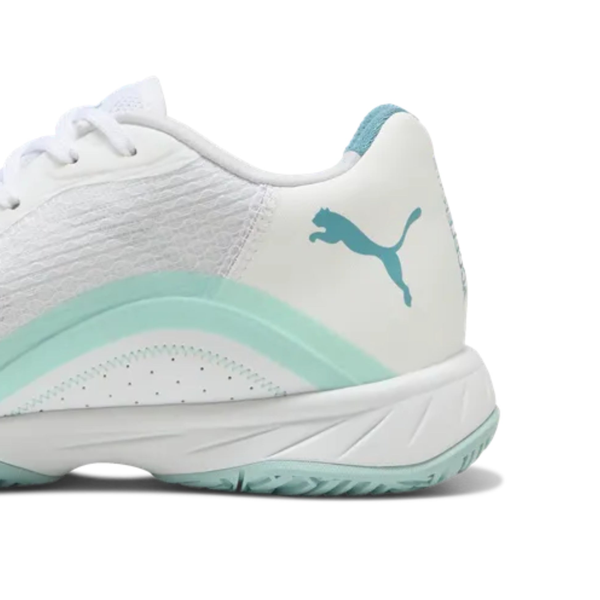 White and light blue netball shoe with Puma logo on a white background