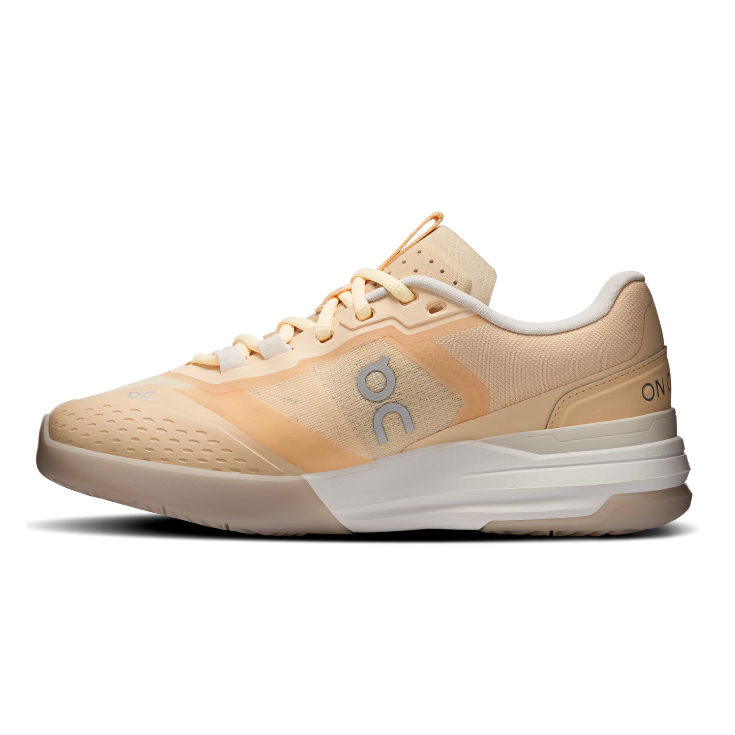 A single On running shoe in a light peach and beige colorway, featuring a white midsole and a small blue On logo on the side, shown against a plain white background.