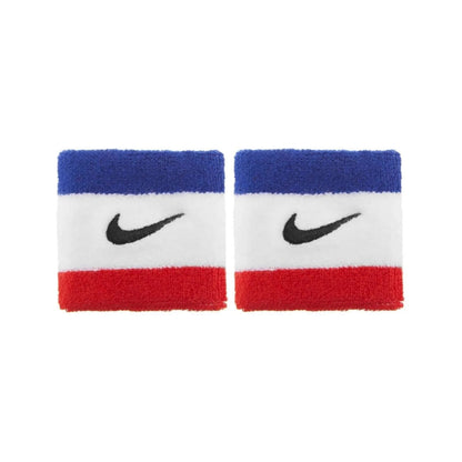 Pair of red, white, and blue wristbands with Nike logo on a white background