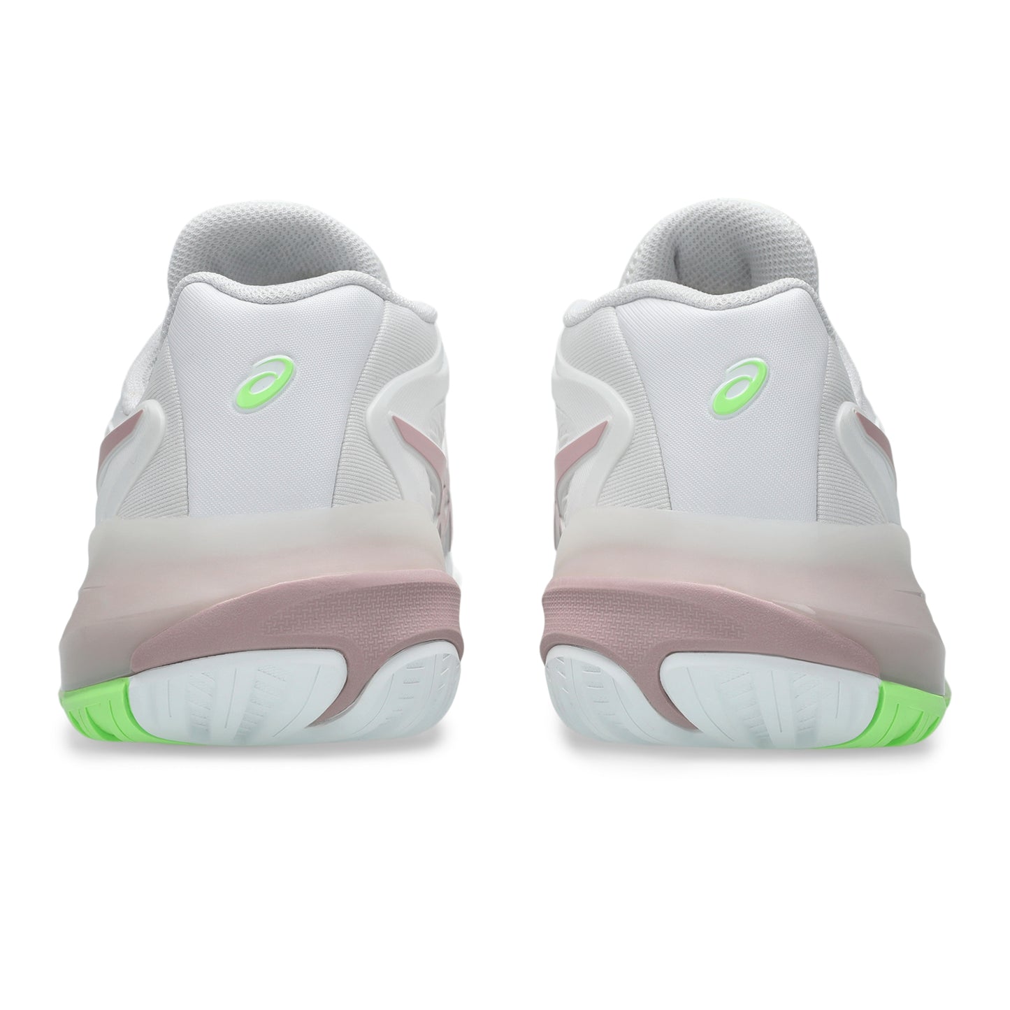 White tennis shoes with green accents on a white background