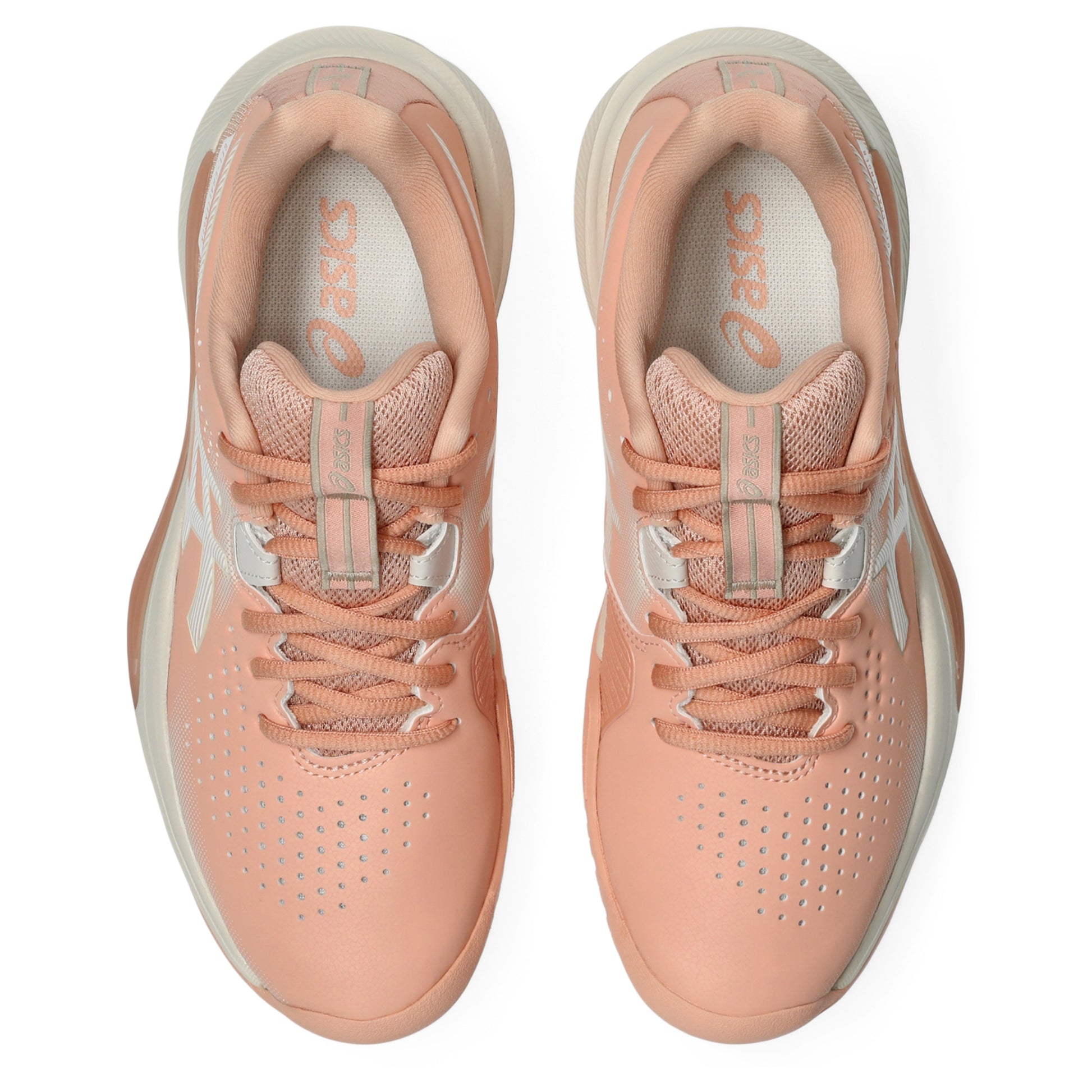 A pair of ASICS tennis shoes shown from a top-down view, featuring a peach and light gray colorway with perforated uppers and matching laces.