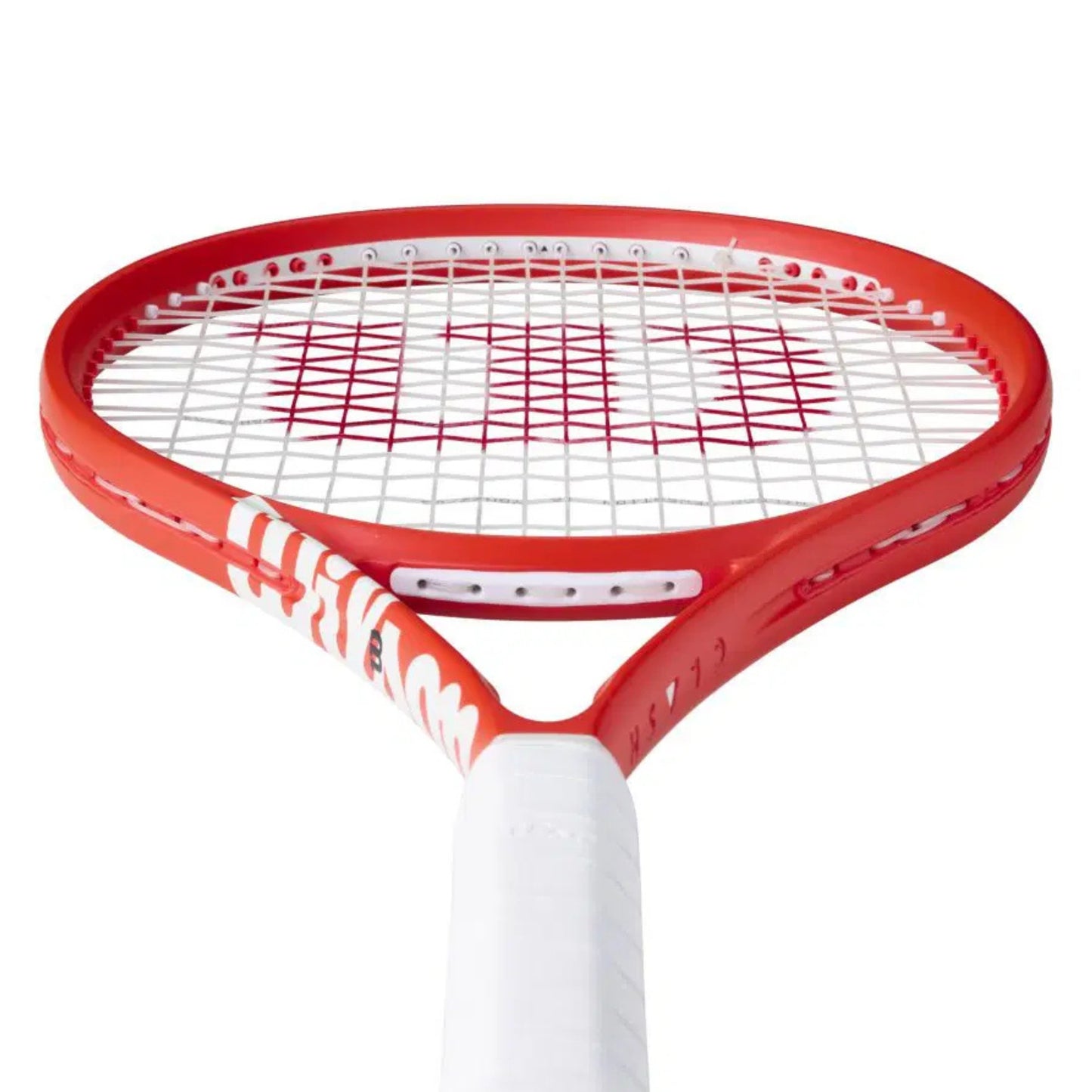 Red tennis racket with white handle on a white background