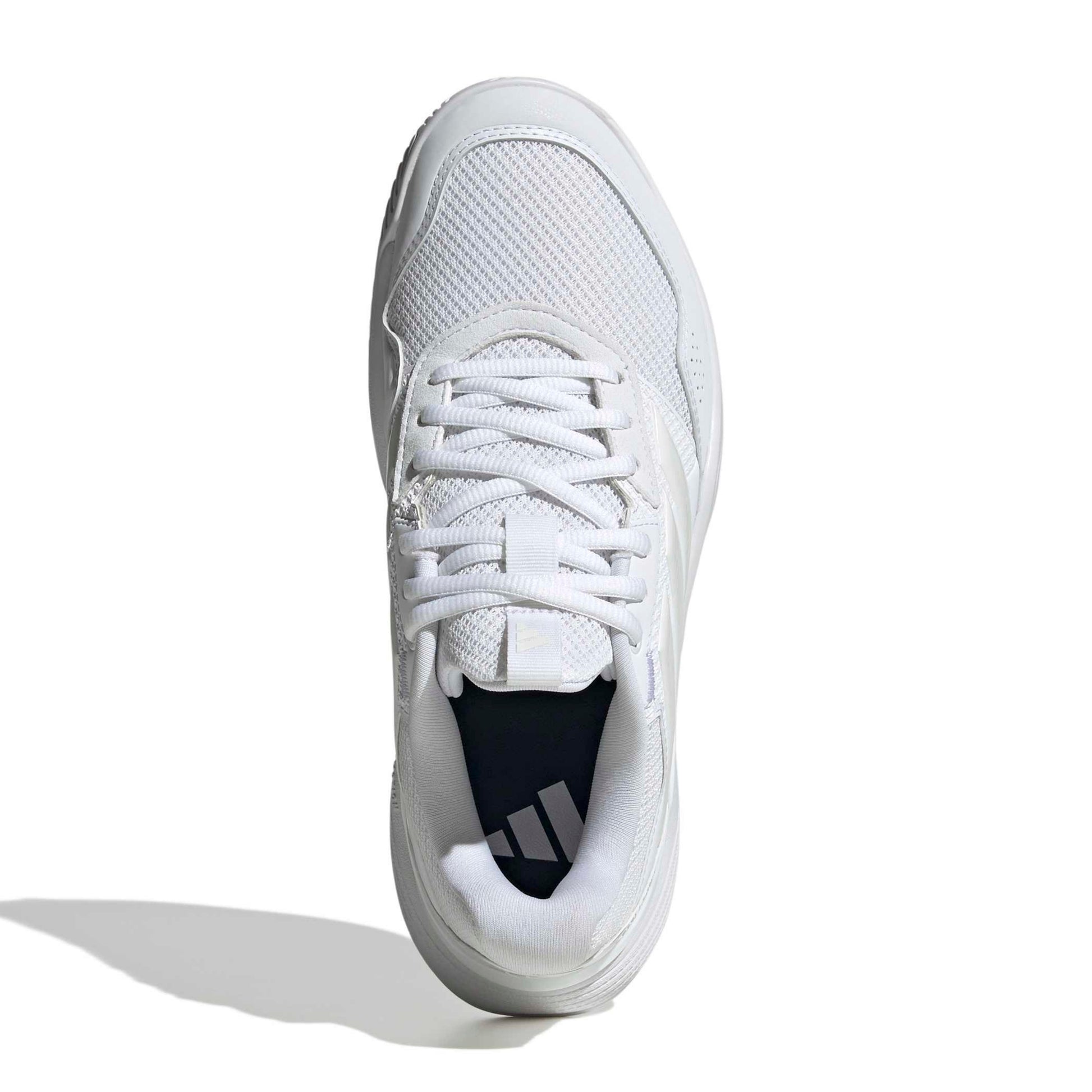 A white Adidas tennis shoe shown from the side profile against a clean white background.