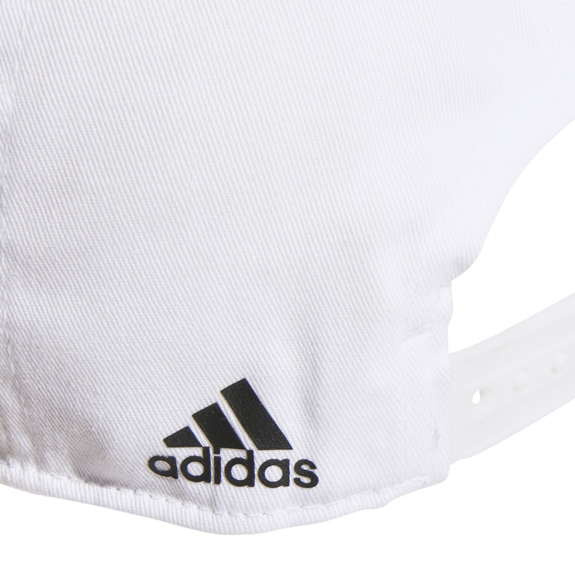 Close-up of a white Adidas cap with black logo