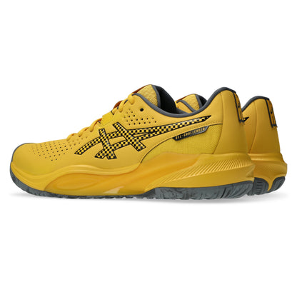 A pair of yellow Asics tennis shoes with black and yellow checkered details on the logo and side, shown against a plain white background.