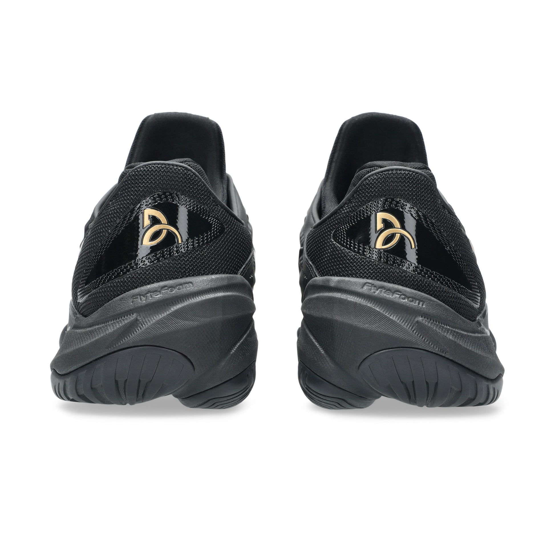 Black tennis shoes with a brand logo on a white background