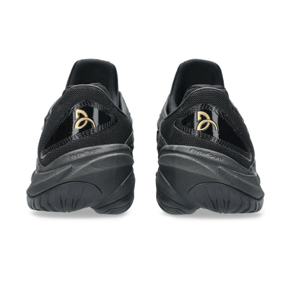 Black tennis shoes with a brand logo on a white background