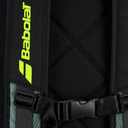 Close-up of a black backpack with Babolat logo and straps.