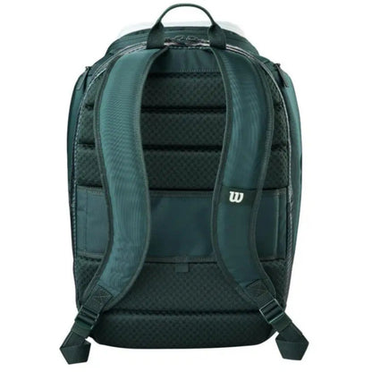 Green backpack with a visible brand logo on a white background