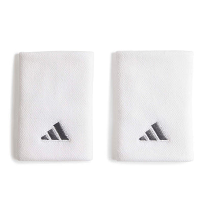 Two white Adidas wristbands with the classic three-bar logo in dark gray, displayed side-by-side on a clean white background.