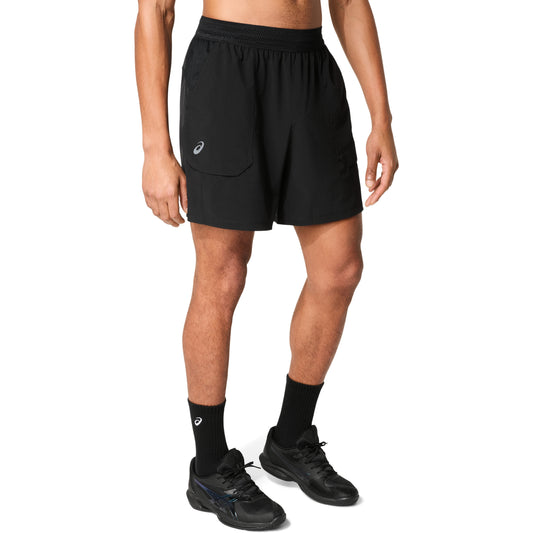 Man wearing black shorts with logo on right leg , on a white background