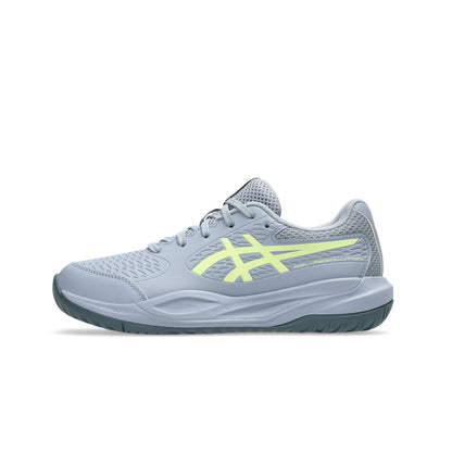 Gray tennis shoe with yellow logo on a white background