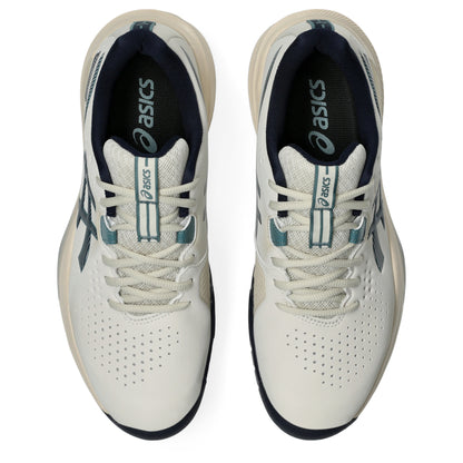 A pair of ASICS tennis shoes shown from a top-down view on a plain white background. The shoes feature an off-white upper with perforated details, navy blue lining and accents, and teal logo details on the tongue and side.