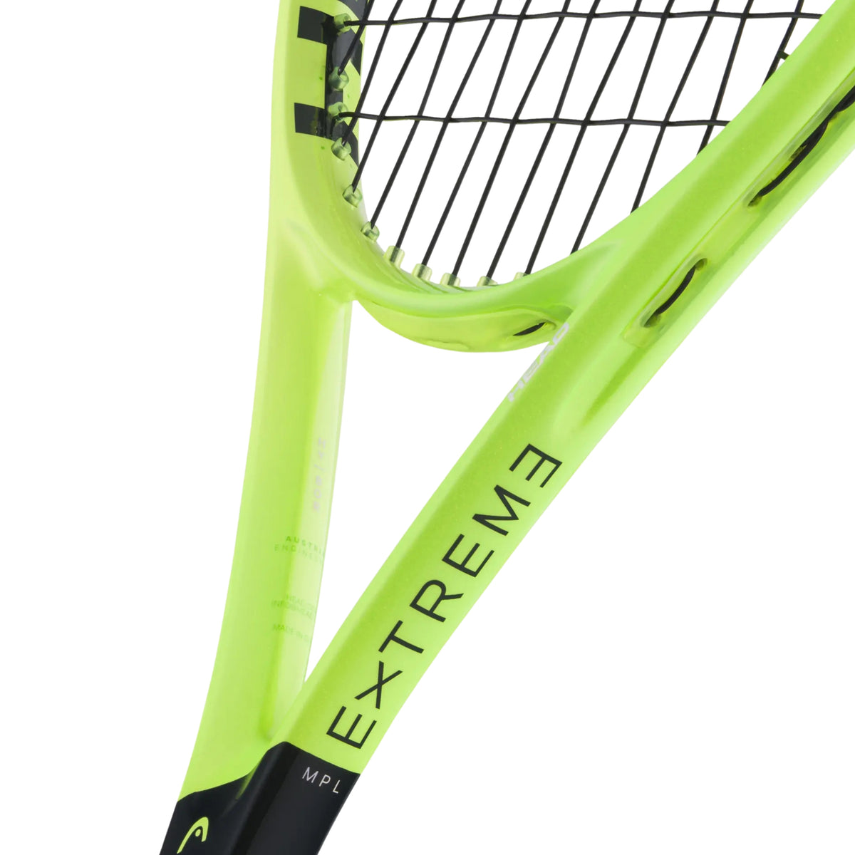 Close-up of a Head tennis racket frame in bright neon yellow-green with black strings and black printed branding text reading 'EXTREME' on a white background.