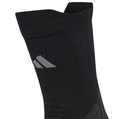 A close-up of a black athletic sock featuring a gray knit logo on the side, set against a plain white background.