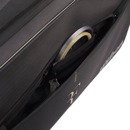 Black tennis bag with a visible brand logo on a white background