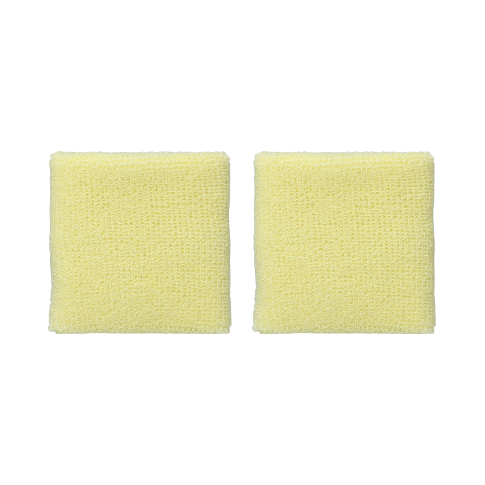 Two light yellow wristbands on a white background
