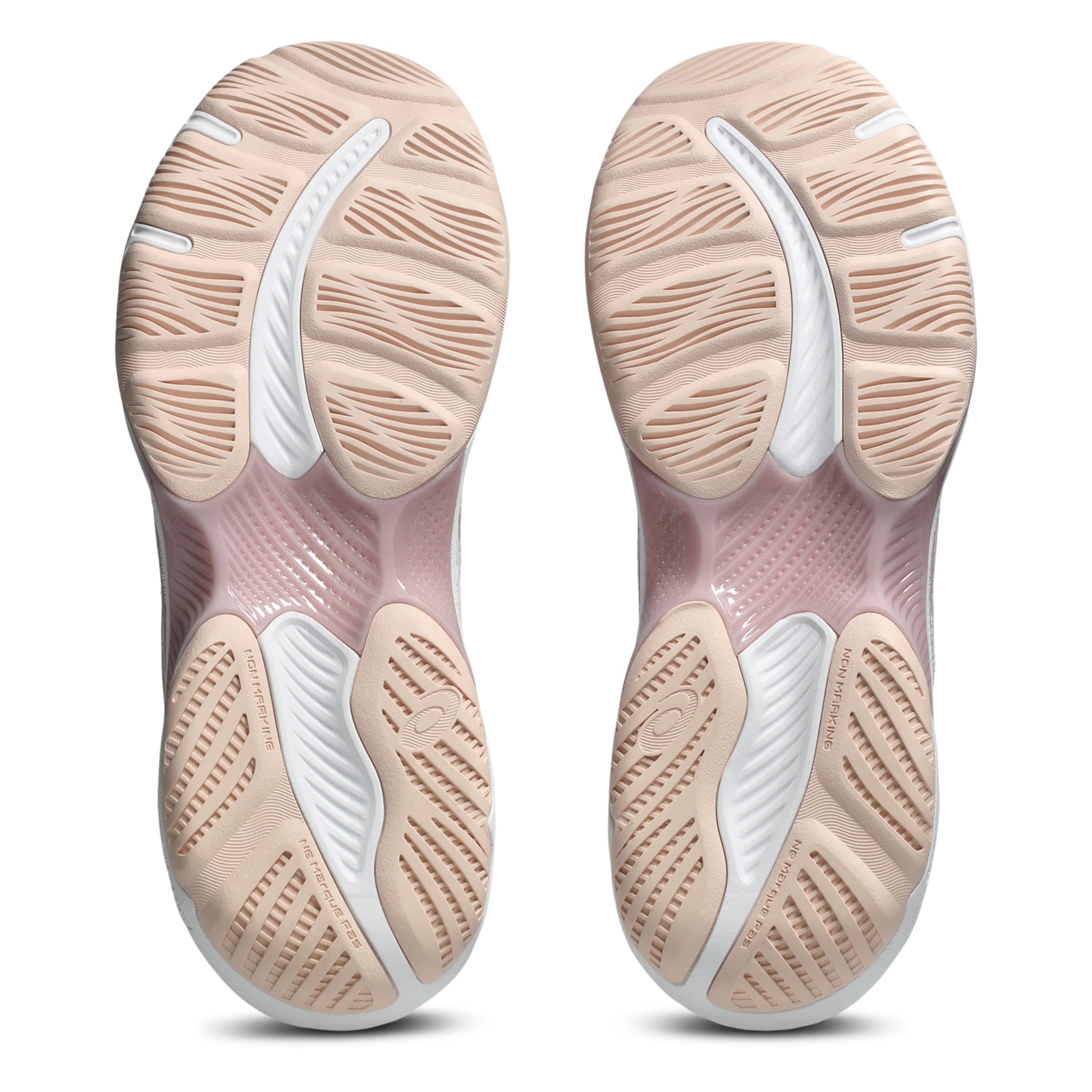 Close-up of a pair of netball shoe soles with a focus on the sole design.