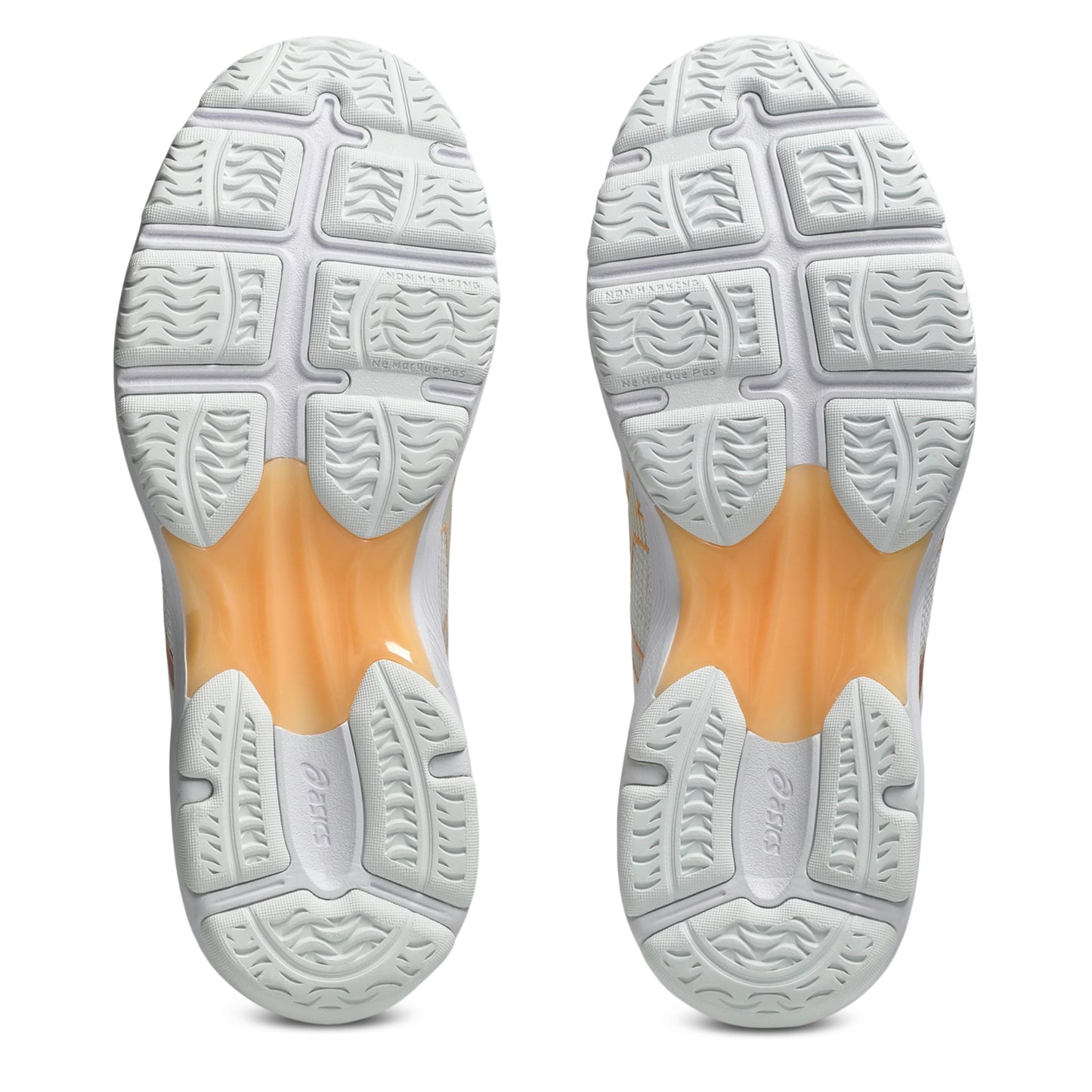 A pair of netball shoes shown from the sole view, featuring a white textured outsole with a translucent orange midsole section.