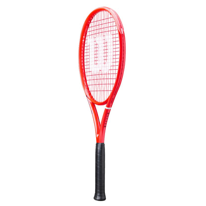 A red Wilson tennis racket with a black grip, shown vertically against a plain white background.