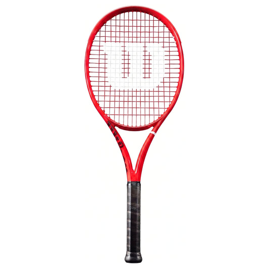 A red Wilson tennis racket with a black grip and white string pattern logo, centered on a plain white background.