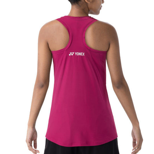 Person wearing a pink Yonex tank top on a white background
