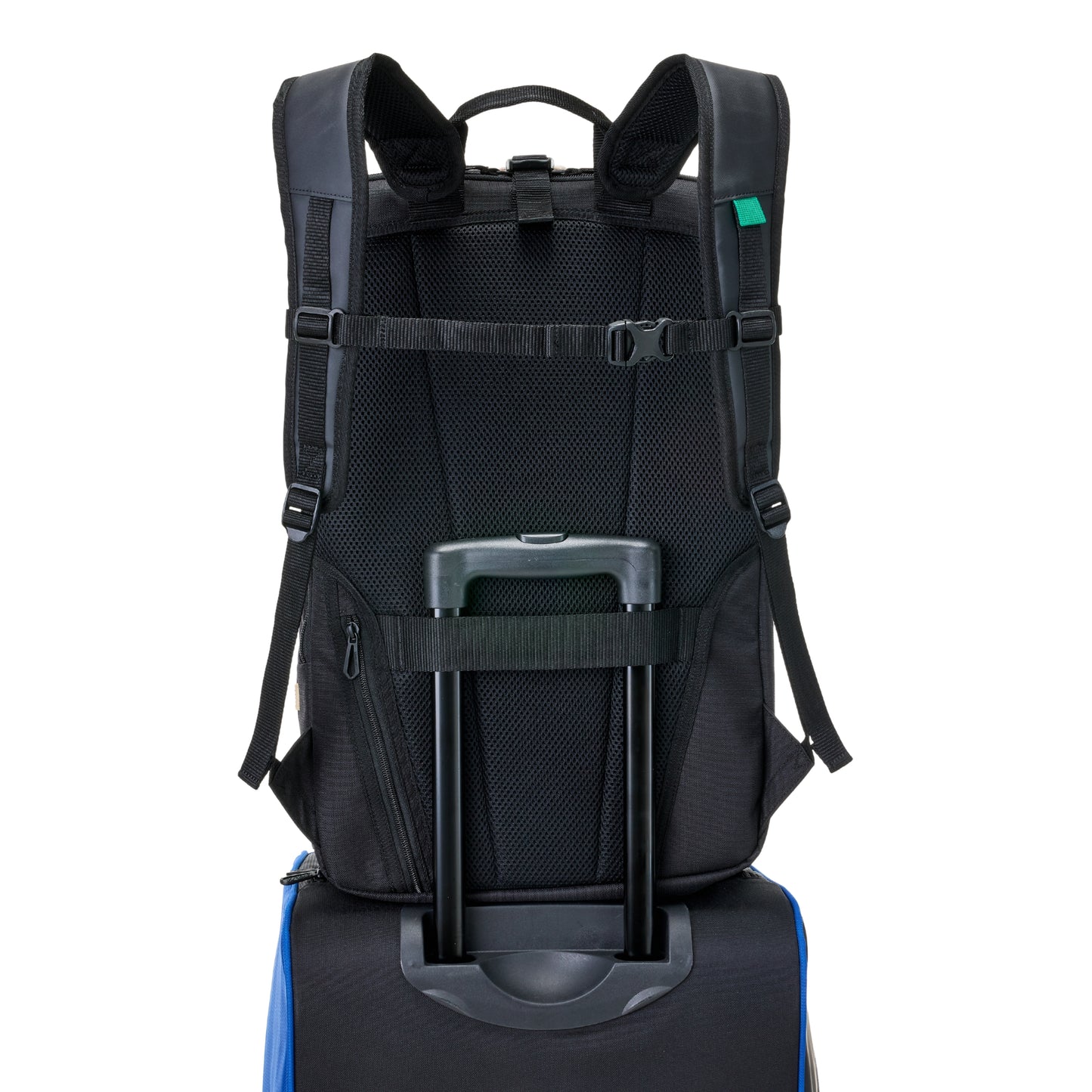 Black backpack on a rolling suitcase attachment on a white background