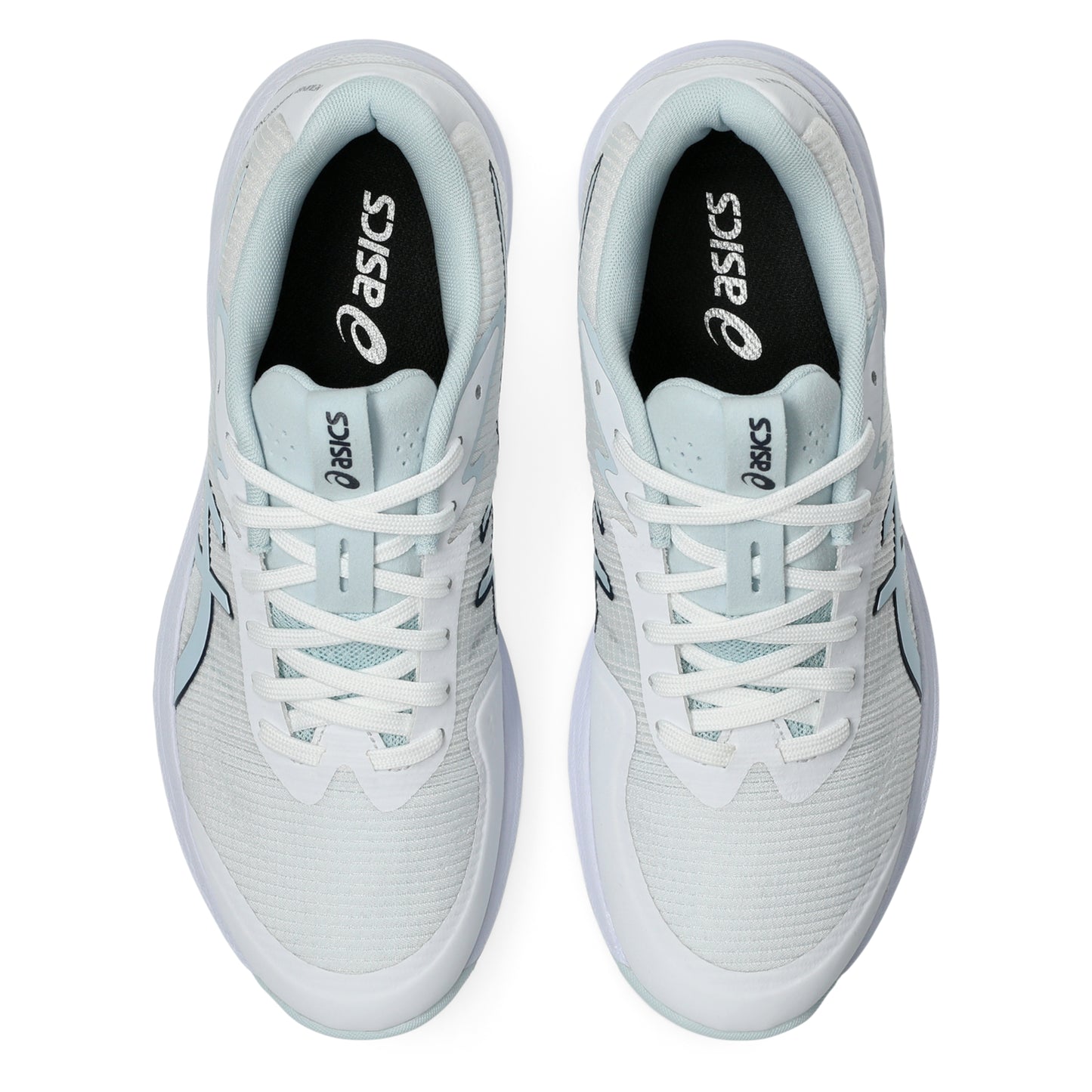 Pair of white Asics netball shoes on a white background