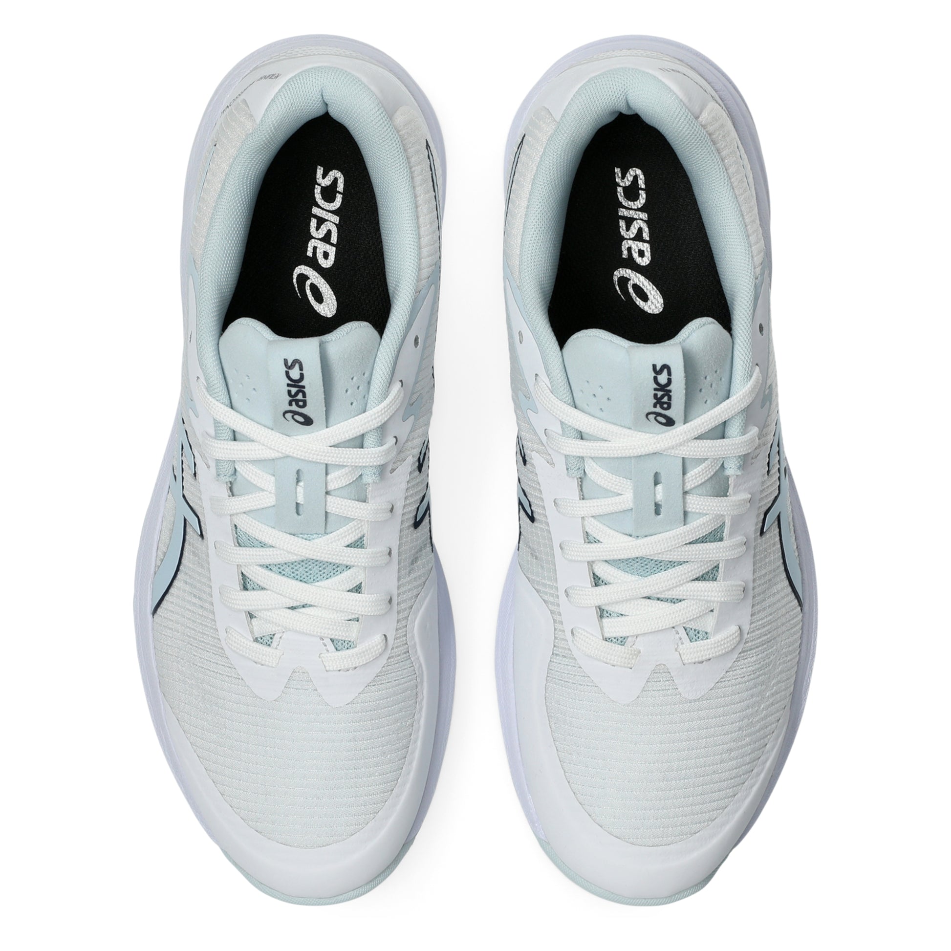 Pair of white Asics netball shoes on a white background