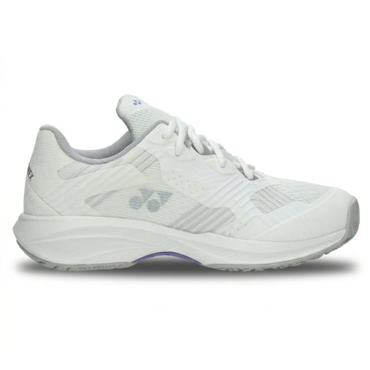 White Yonex tennis shoe with brand logo on a white background