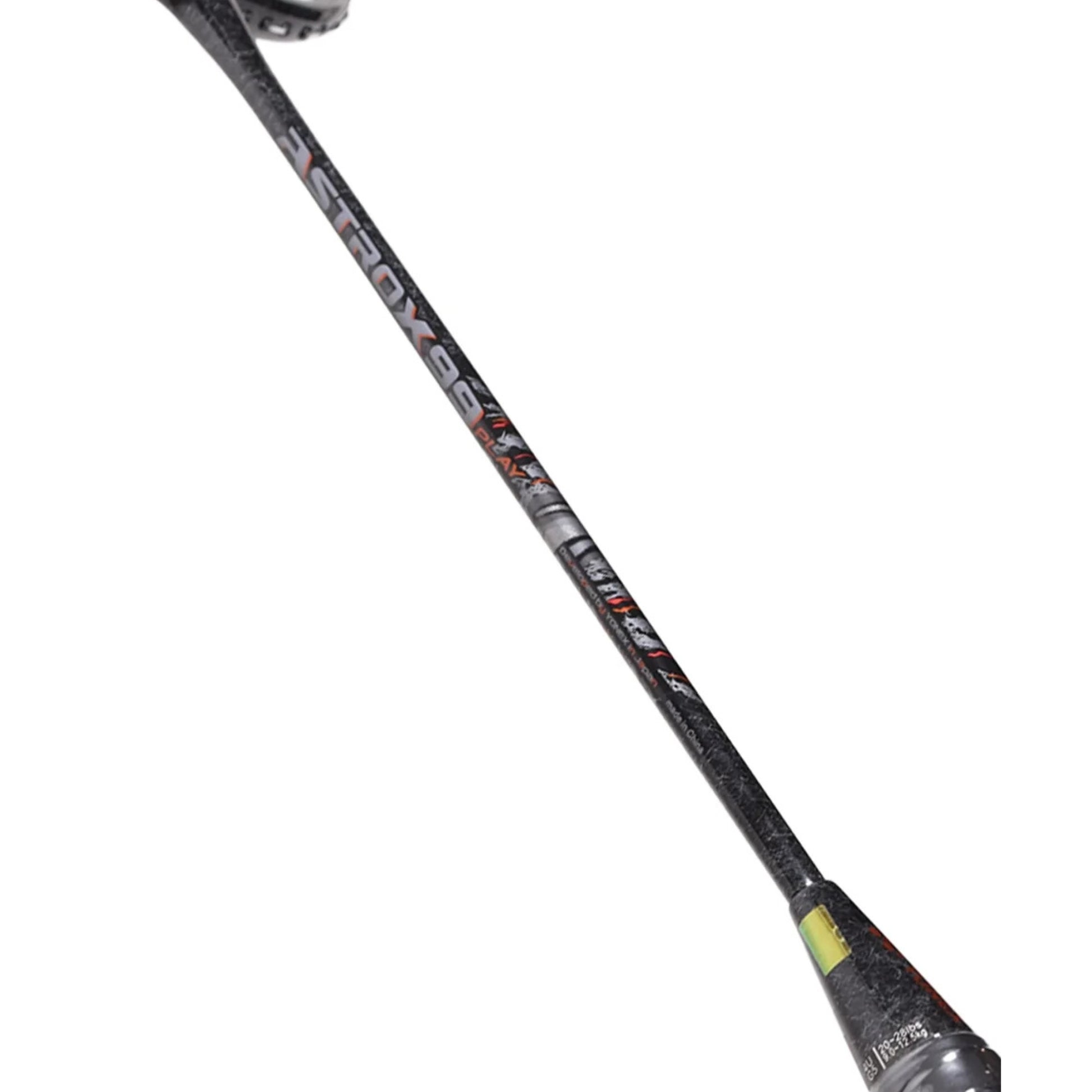 Close-up of a shaft of a black and green Yonex Astrox 99 Play badminton racket on a white background