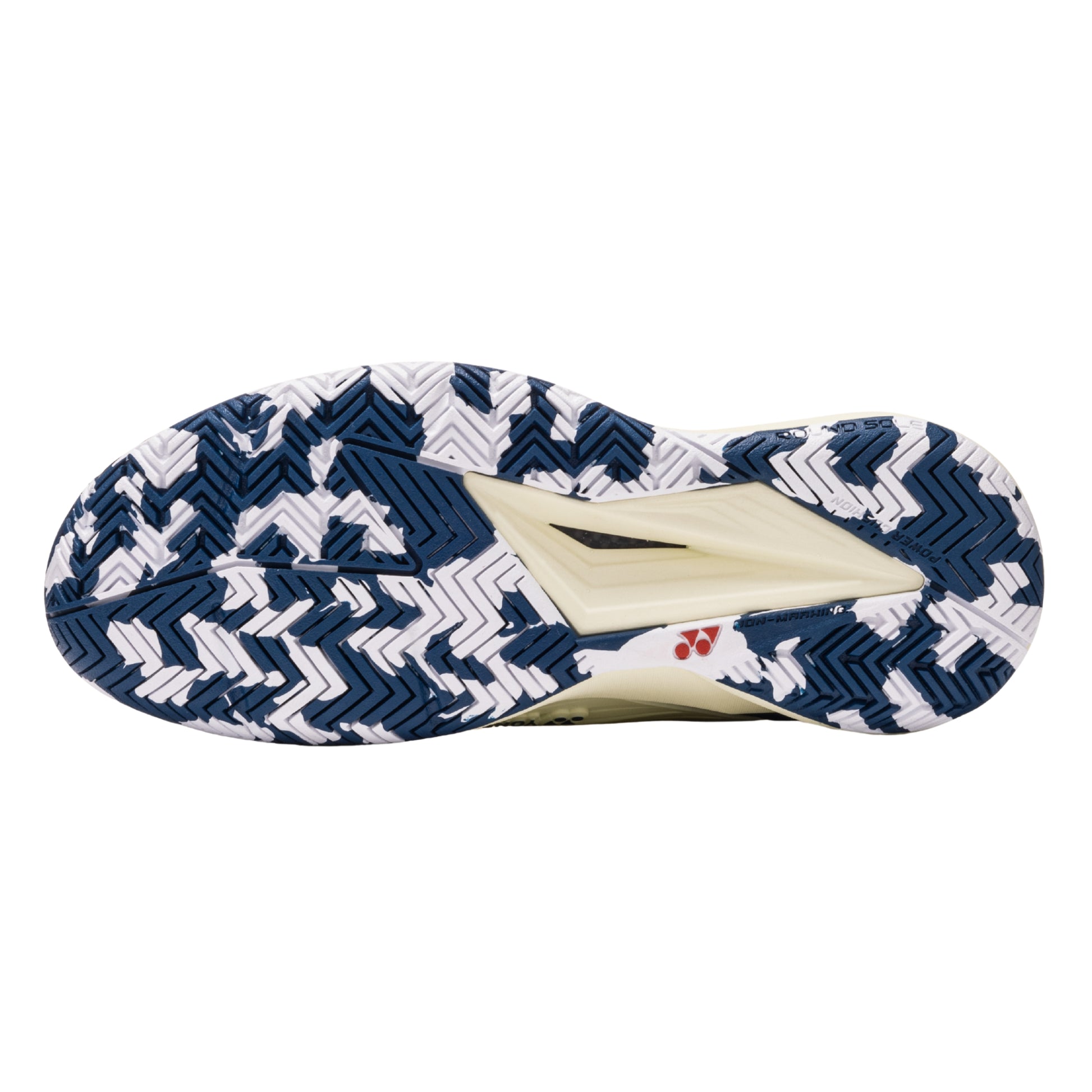 Close-up of a shoe sole with a zigzag pattern on a white background