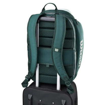 Green backpack with Wilson logo on a white background