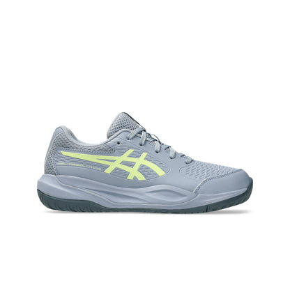 Gray tennis shoe with a yellow logo on a white background