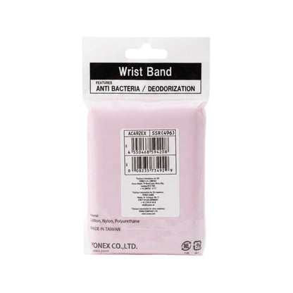 Pink wrist band packaging with branding and product details on a white background