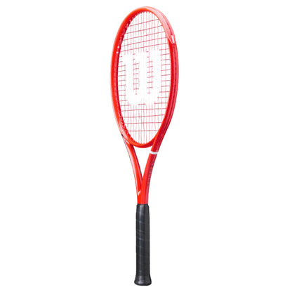 A red and white Wilson tennis racket with a black grip, shown vertically against a plain white background.