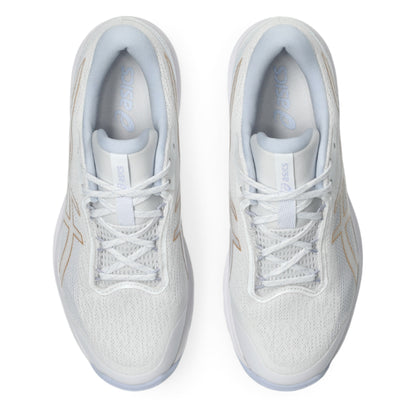 Pair of white tennis shoe with gold accents on a white background