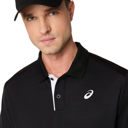 Man wearing a black polo shirt white logo on shirt and on a white background 