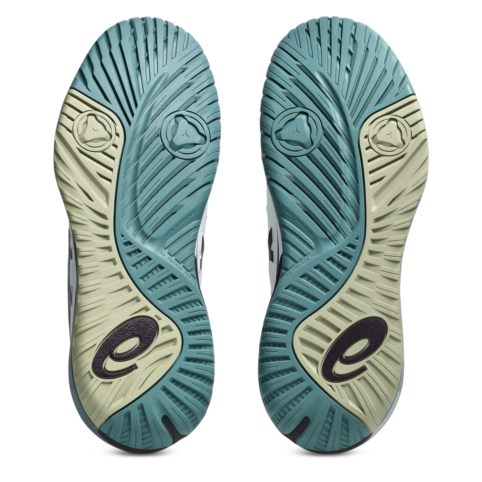 The outsoles of a pair of tennis shoes, showing a dual-tone design with teal blue and light sage green sections, featuring a black stylized 'e' logo near the heel.
