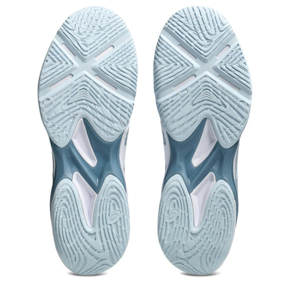Close-up of blue squash shoes with tread pattern on a white background