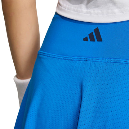 Close-up of a adidas blue skirt on a white background