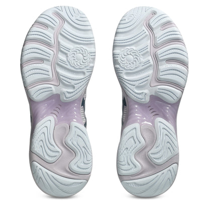 Close-up of the sole of a shoe with a wavy pattern on a white background