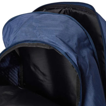 Close-up of a navy blue backpack with a textured pattern on a white background