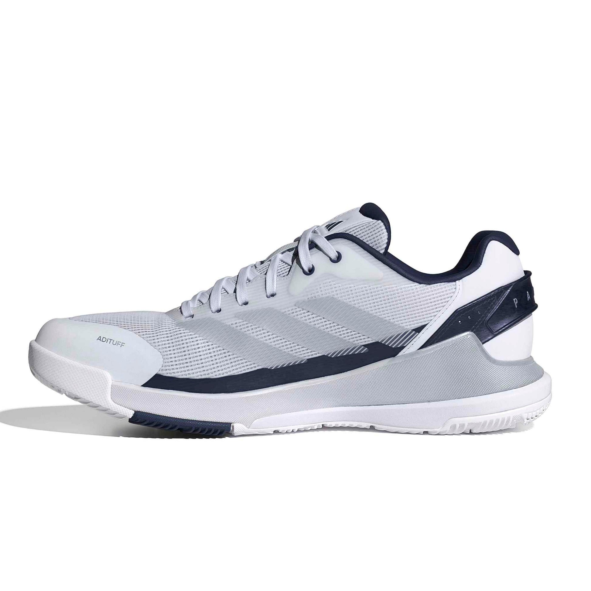 A white and navy blue Adidas padel shoe shown from the side profile on a clean white background.